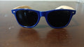 eco-friendly" or "wood-arm" wayfarer.